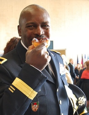 Veteran's  Day-  officer  w  hat and  donut.jpg